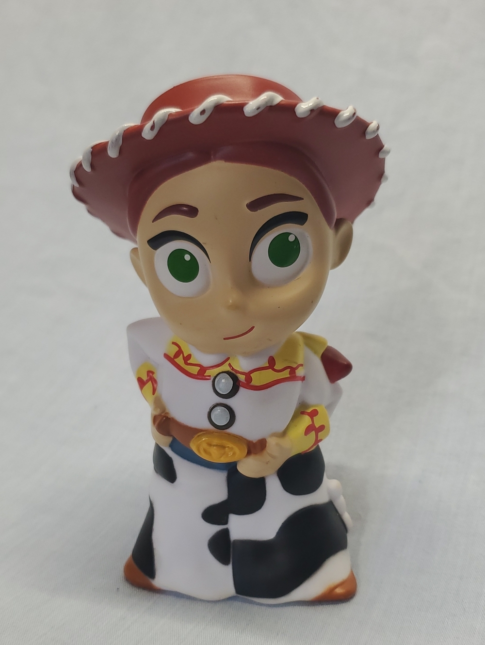 Disney Cowgirl Figure with Red Hat and Green Eyes